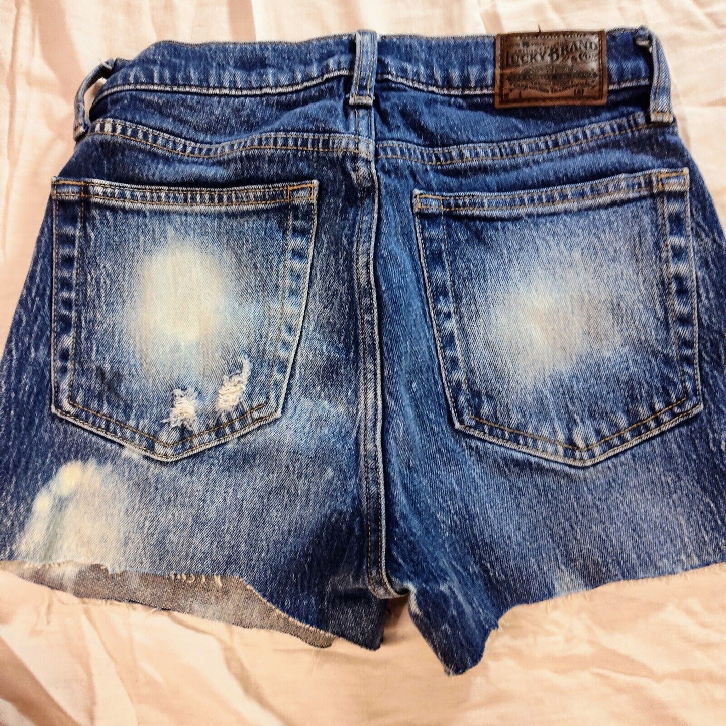 Lucky Brand Raw Destroyed Denim Jean Shorts Sz 2 26 Mid Rise Cut Off Distressed